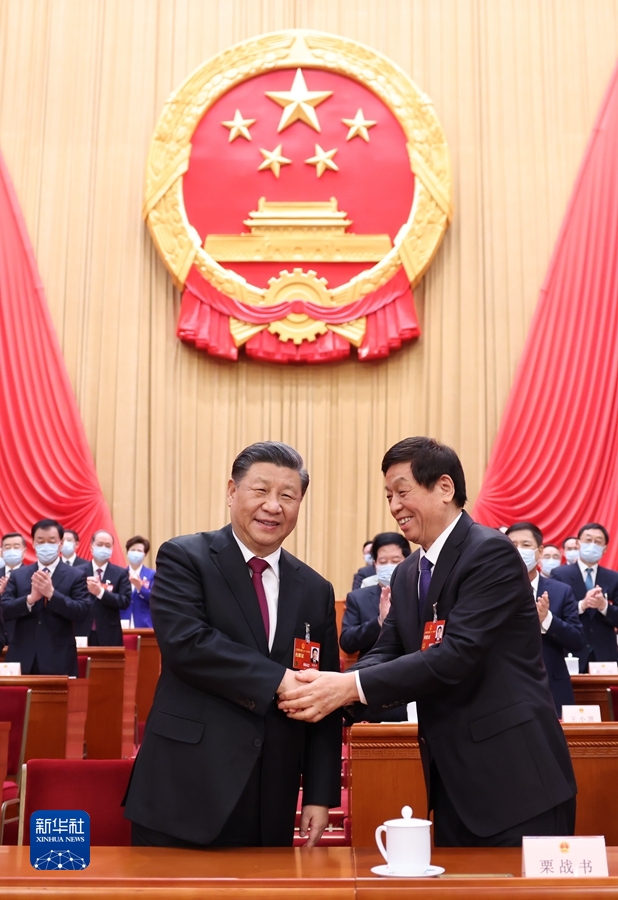 十四届全国人大一次会议选举产生新一届国家领导人 习近平全票当选国家主席中央军委主席 赵乐际当选全国人大常委会委员长 韩正当选国家副主席 新当选国家领导人进行宪法宣誓 会议批准国务院机构改革方案(图3)